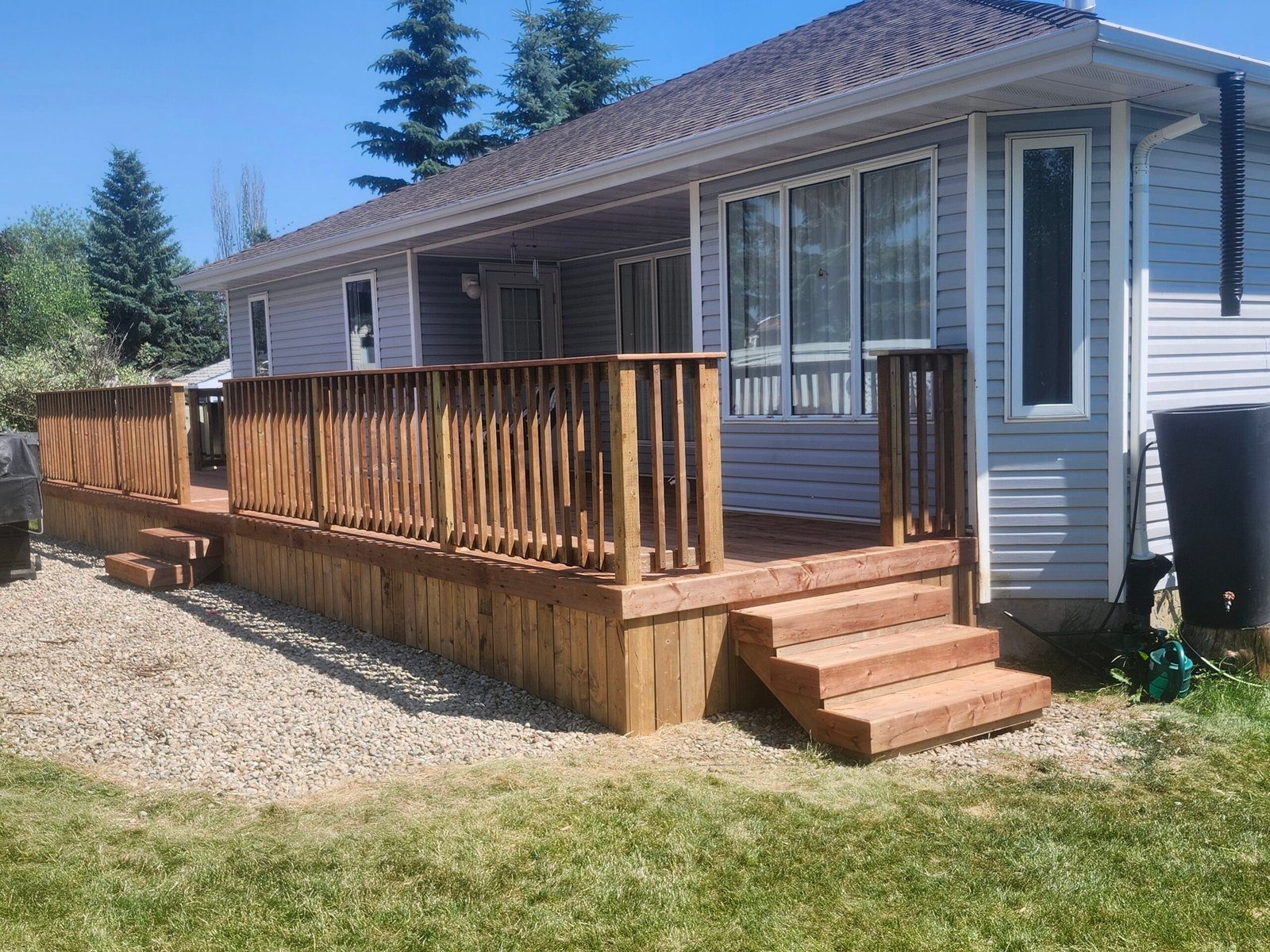 Wooden Deck with Wooden Railing in St Albert
