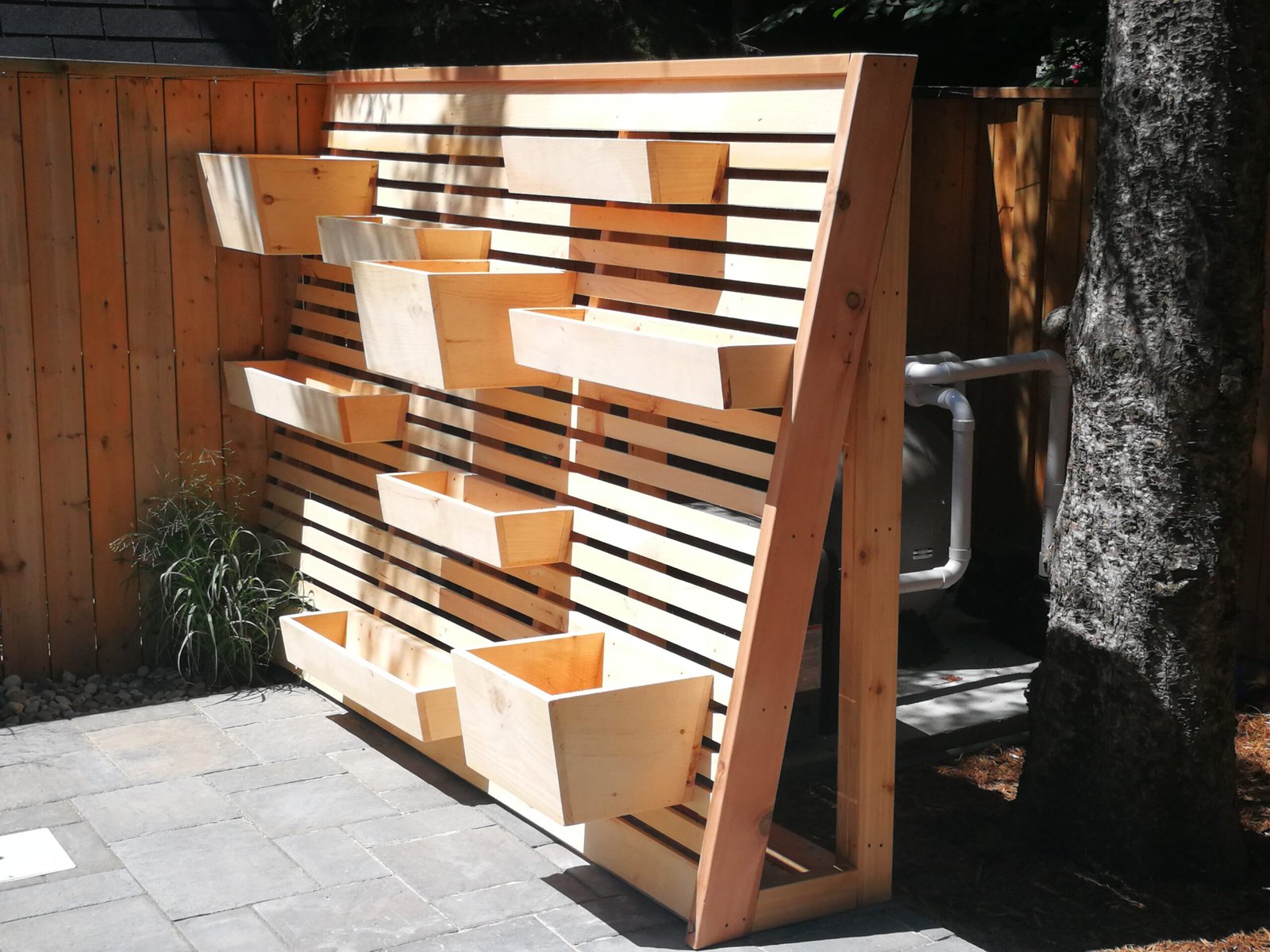 custom planter screen on a backyard deck